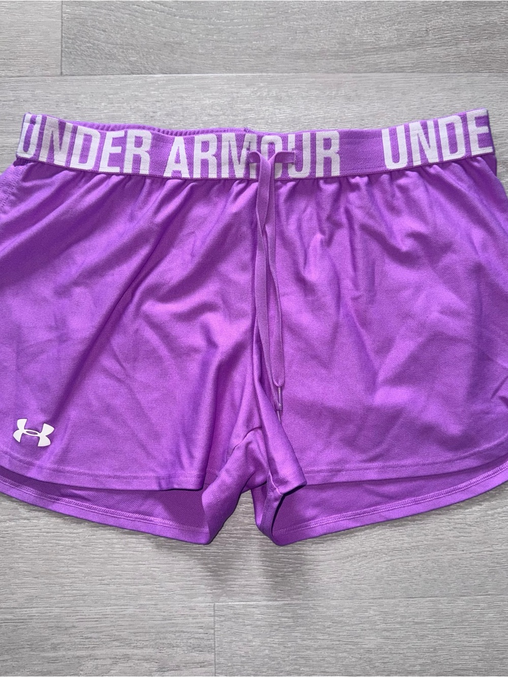 Under Armour Women's Bright Purple Athletic Shorts with White Logo